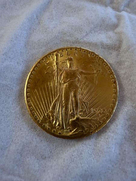 1 1928 twenty dollar gold coin, 8 silver…