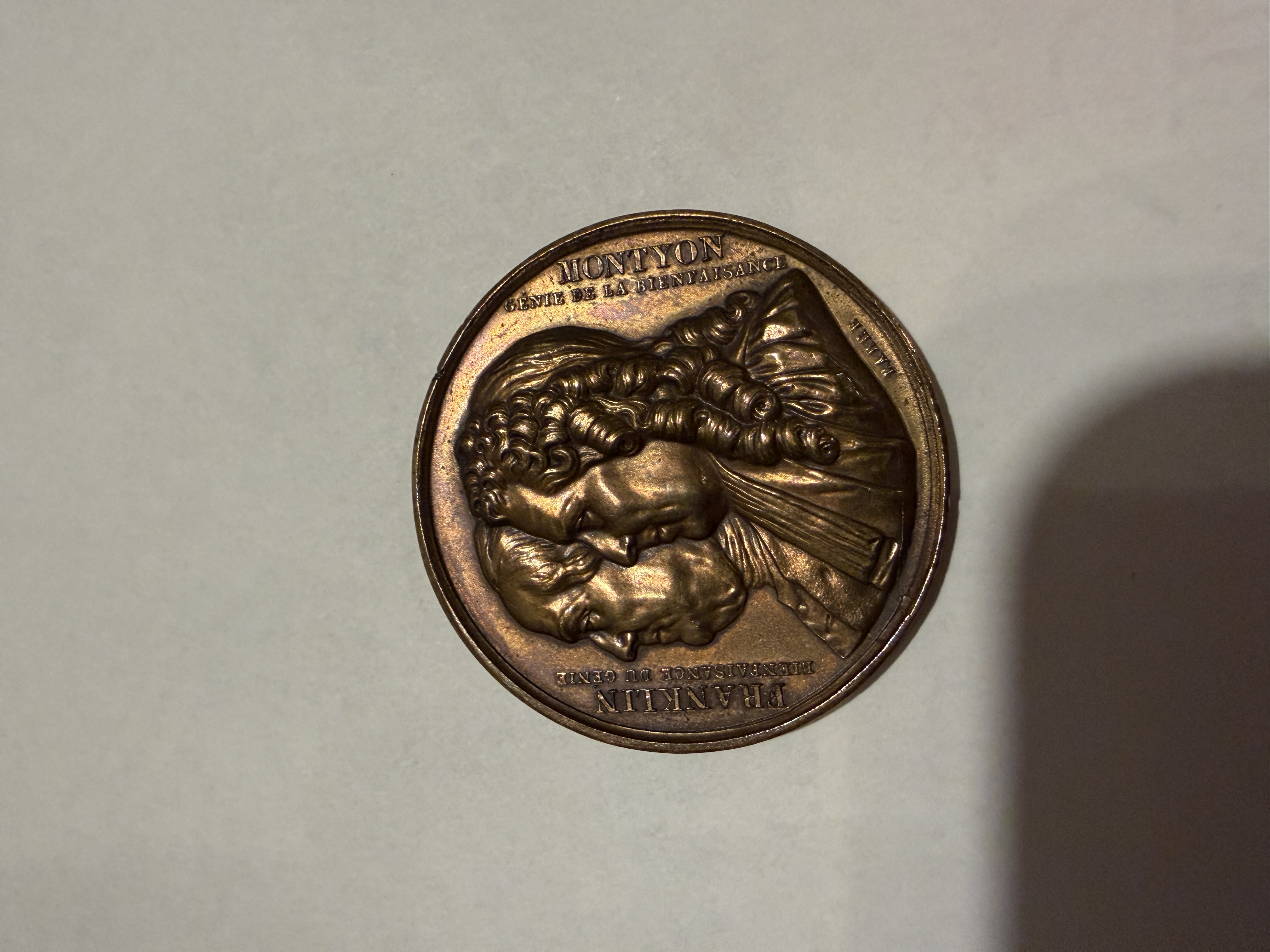 This coin weighs 32 grams and is 1.5in…