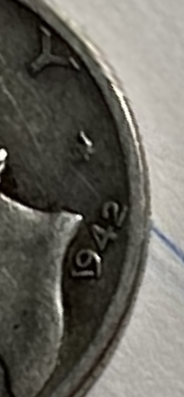1942 mercury dime with the one in date…