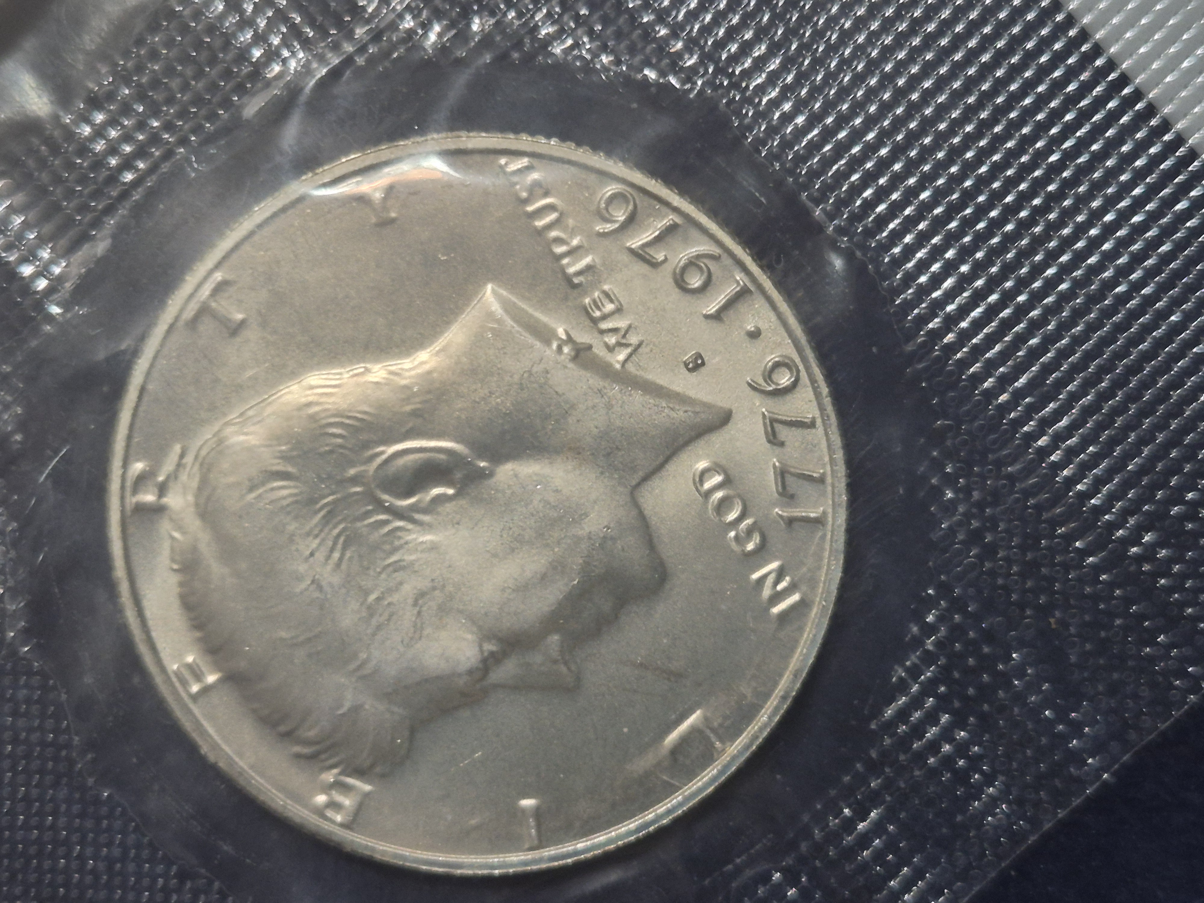 1976-S uncirculated silver half dollar. Its in a…