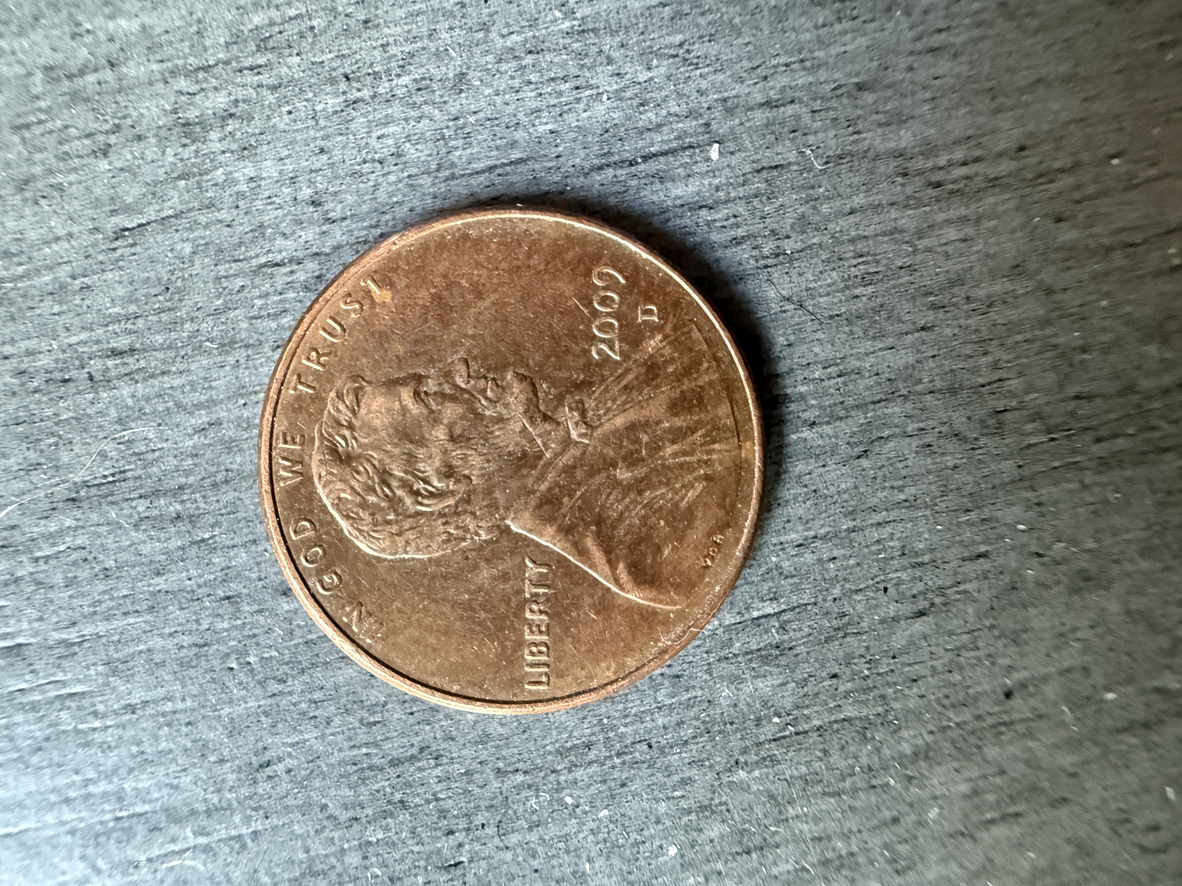 This penny has a different memorial picture .…